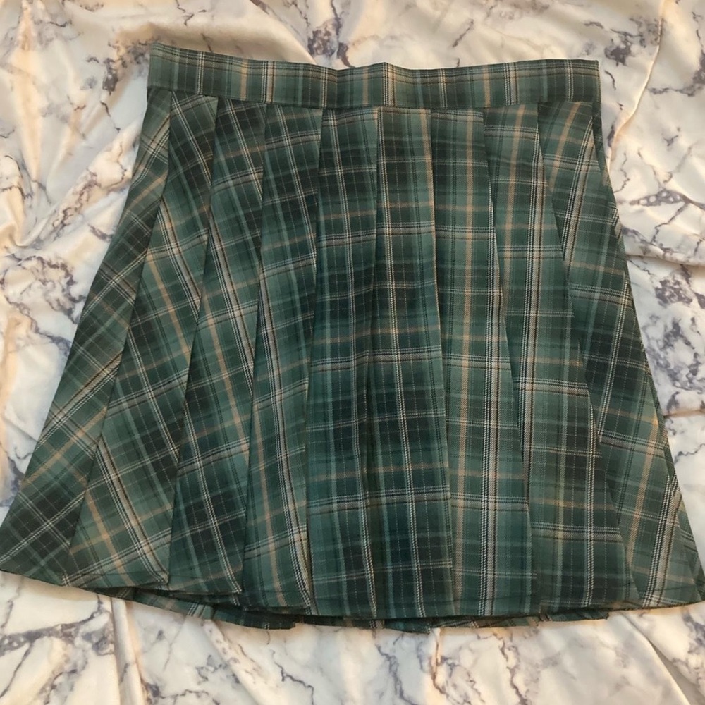Green plaid pleated mini skirt